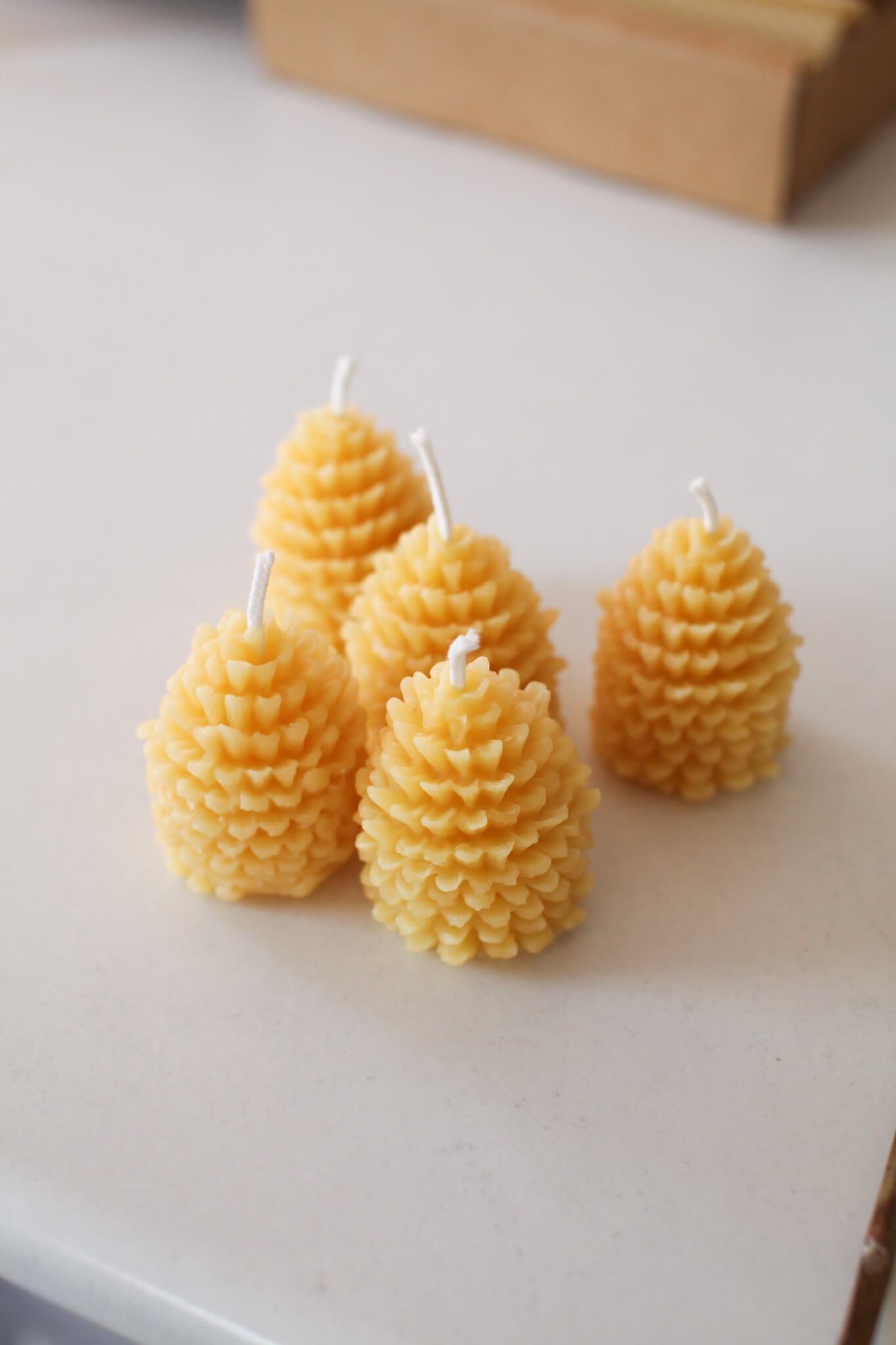 Beeswax pine cone candles - Bee native products